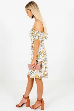 Bella Ella Boutique Honeysuckle White Floral Off-Shoulder Mini Dress 11 Bella Ella Boutique Honeysuckle White Floral Off-Shoulder Mini Dress -Bella Ella Sales Honeysuckle White Floral Off Shoulder Mini Dress Side 5000x