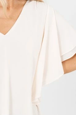 Zenana Take Care Flutter Sleeve Blouse 19 Zenana Take Care Flutter Sleeve Blouse -Bella Ella Sales Take Care Cream Blouse Detail 5000x