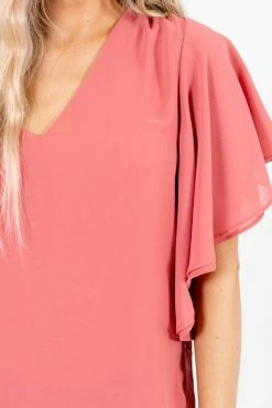 Zenana Take Care Flutter Sleeve Blouse 30 Zenana Take Care Flutter Sleeve Blouse -Bella Ella Sales TakeCarePinkBlouseDetail 5000x