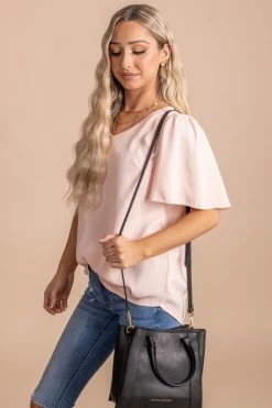 Zenana Taking Chances Flutter Sleeve Blouse 15 Zenana Taking Chances Flutter Sleeve Blouse -Bella Ella Sales TakingChancesFlutterSleeveBlouseSide 5000x