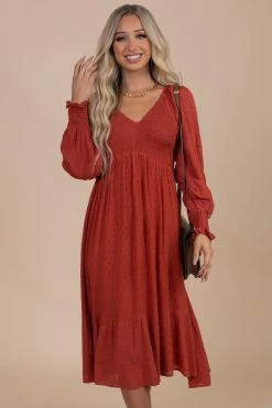In Loom No Place Like You Smocked Long Sleeve Midi Dress -Bella Ella Sales red main 383b3f92 1379 4f11 ba22 4bccb655ffb8 5000x